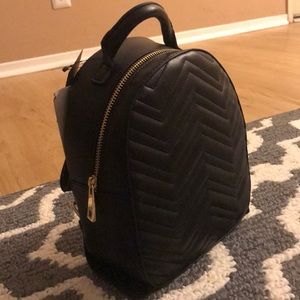 All black mini backpack